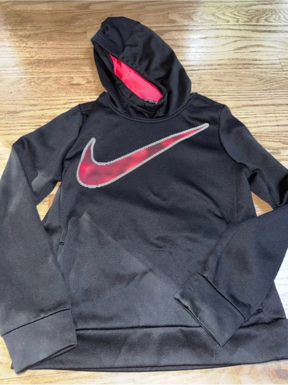 Nike Kids Black Hoodie with Pink Swoosh and pink Hood Lining